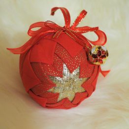 red ornament with bell